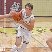 Milbank Hits 12 Three-Pointers in Battle of the Bulldogs