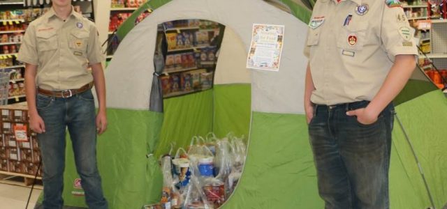 Boys Scouts Put Up Tents for Food Drive