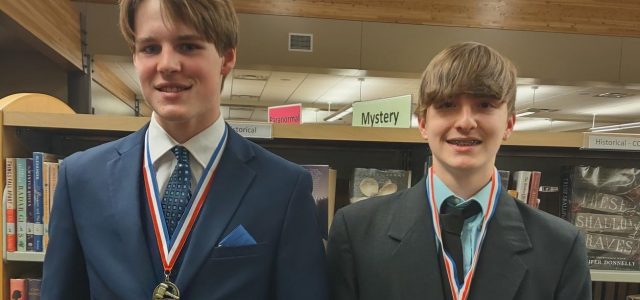 Grant and Frerichs Take First at Fargo Debate Tournament
