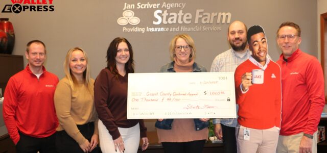 Jan Scriver – State Farm Insurance Gives $1000 to GC Combined Appeal 